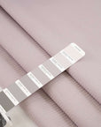 Soft cotton jacquard fabric in pale purple. High quality deadstock fabric.