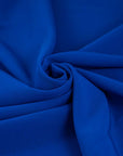 Electric blue with droopy and stretchy polyester technical fabric. High quality deadstock fabric.
