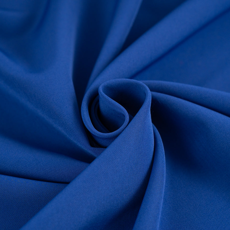 Stretching and falling blue technical fabric. High quality deadstock.