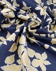Printed polyester cinzato with floral design in dark blue, ecru, and yellow, very crunchy and not transparent, ideal for structured garments and bold pieces. High-quality deadstock collected in Stock from a Maison de Couture in Italy.