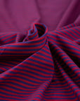 Purple and fuchsia cotton jersey, soft and stretchy. Deadstock fabric picked up from a Maison de Couture in Italy.