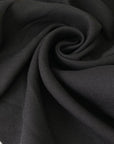 Soft and flowy cotton and wool crêpe with a slight sheen. Not transparent and ideal for jackets, dresses, and skirts.High-quality deadstock collected in Stock from a Maison de Couture in Italy.