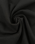 Black heavy punto milano jersey, stretch, soft. High-quality deadstock collected in Stock from a Maison de Couture in Italy.