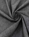 Black melange lightweight cotton denim, soft and non-stretch. Perfect trousers. High-quality deadstock collected in Stock from a Maison de Couture in Italy.