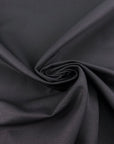 Black structured cotton denim and non-stretch. Perfect for jackets. High-quality deadstock collected in Stock from a Maison de Couture in Italy.