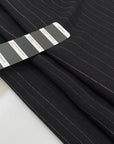 Pure viscose crepe in black with stripe design in rose lurex, very soft, flowy and not transparent. High-quality deadstock fabric by the meter collected in Stock from a Maison de Couture in Italy.