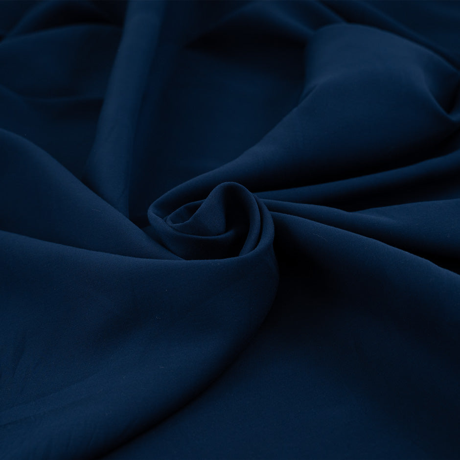 Soft and heavy blue cotton and silk fabric. High-quality deadstock fabric collected in Stock from a Maison de Couture in Italy.