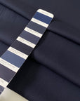 Soft and lightweight elasticized silk georgette in dark blue with slight transparency. Ideal for dresses, skirts, blouses, and shirting.
High-quality deadstock collected in Stock from a Maison de Couture in Italy.