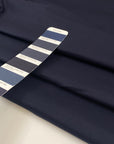 Very soft, medium-weight elasticized cotton in a rich midnight blue. Not transparent and ideal for structured yet comfortable garments. High-quality deadstock collected in Stock from a Maison de Couture in Italy.