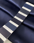 Elegant dark blue pure silk satin, soft and lightweight with a glossy finish. Not transparent, ideal for dresses, blouses, skirts, nightwear and lingerie.High-quality deadstock collected in Stock from a Maison de Couture in Italy.