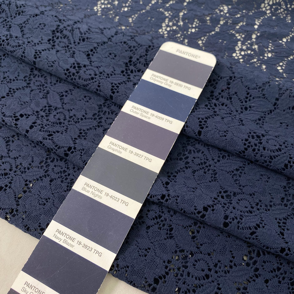 Blue polyester stretch lace with floral design very soft and light ideal for dresses skirts blouses and trousers. High-quality deadstock collected in Stock from a Maison de Couture in Italy.