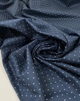 Cotton poplin with polka dot design in dark blue and white, very soft, light, and not transparent, ideal for shirts, dresses, and skirts. High-quality deadstock collected in Stock from a Maison de Couture in Italy.