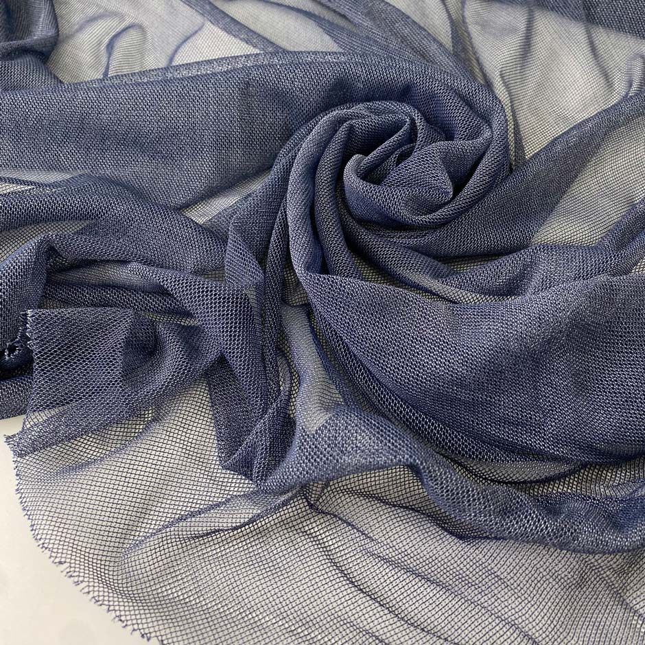 Very soft, light, flowy and transparent cotton-polyester stretch net in blue. Ideal for dresses and skirts. High-quality deadstock collected in Stock from a Maison de Couture in Italy.