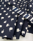 Pure printed silk twille blue and white. Falling, light and floral. High-quality deadstock fabric by the meter collected in Stock from a Maison de Couture in Italy.