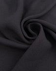 Black pure viscose crepe de chine, soft, fluid and non-stretch. High-quality deadstock collected in Stock from a Maison de Couture in Italy.