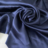 Elegant dark blue pure silk satin, soft and lightweight with a glossy finish. Not transparent, ideal for dresses, blouses, skirts, nightwear and lingerie.High-quality deadstock collected in Stock from a Maison de Couture in Italy. Elegant dark blue pure silk satin, soft and lightweight with a glossy finish. Not transparent, ideal for dresses, blouses, skirts, nightwear and lingerie.High-quality deadstock collected in Stock from a Maison de Couture in Italy.