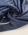 Blue silk and polyester organza with stripes. High-quality deadstock fabric collected in Stock from a Maison de Couture in Italy.