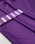Polyester jersey in violet, very soft, light, and slightly shiny, ideal for dresses, tops, and layering pieces. High-quality deadstock collected in Stock from a Maison de Couture in Italy.