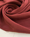 Red fabric of viscose cady and acetate. High quality deadstock.