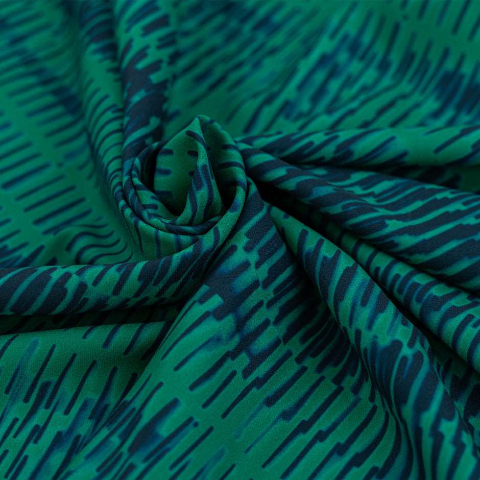 Cady polyester patterned green and blue. High quality deadstock fabric.