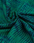 Cady polyester patterned green and blue. High quality deadstock fabric.