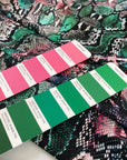 Polyester jersey very stretchy with snakes print. In white, black, green, and pink shades. Very soft and flowy. High-quality deadstock fabric by the meter collected in Stock from a Maison de Couture in Italy.