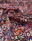 Pure silk chiffon soft and falling. The ground i black and the design is floral and multicolor. High-quality deadstock fabric collected in Stock from a Maison de Couture in Italy.