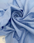 Pure cotton batiste in powder blue, very soft, light, flowy and not transparent. Ideal for shirting, dresses and skirts. High-quality deadstock collected in Stock from a Maison de Couture in Italy.