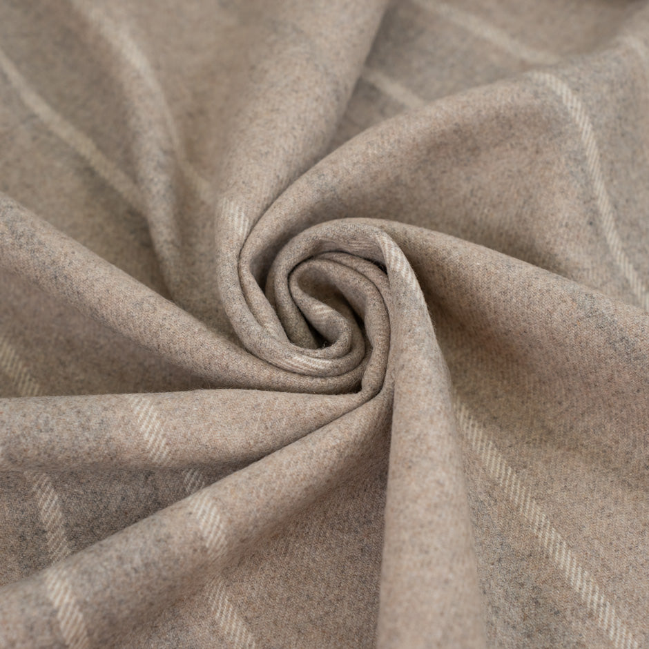 Wool beige striped jacket weight. The fabric is heavy and structured. High-quality deadstock fabric collected in Stock from a Maison de Couture in Italy.