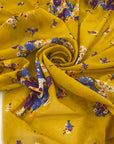 Pure cotton voile with an ochre base and floral print in violet, light blue, white, and orange. Soft, light, and slightly transparent. Ideal for dresses, skirts, and shirting.
High-quality deadstock collected in Stock from a Maison de Couture in Italy.