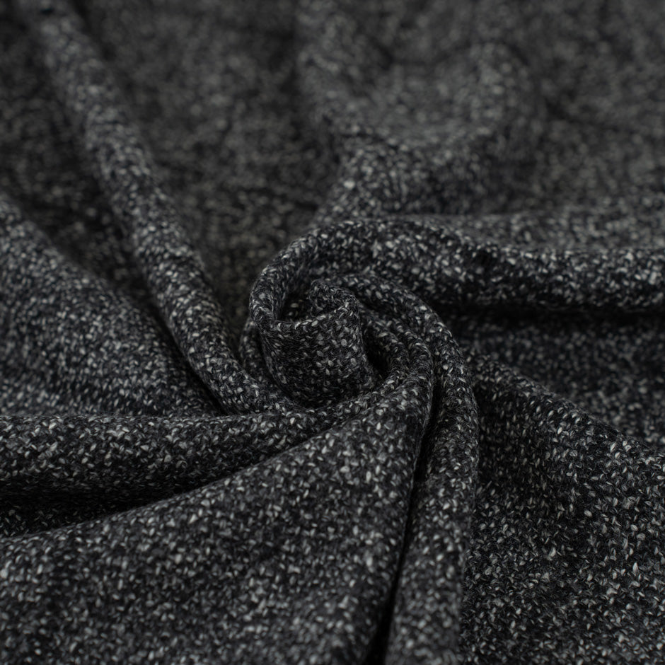 Mixed melange squared wool and nylon fabric. It is heavy and structured. High-quality deadstock fabric collected in Stock from a Maison de Couture in Italy.
