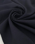Wool blend with cotton, textured and heavy, in dark blue (Blue Nights). Ideal for jackets, structured trousers, skirts, or light coats.
High-quality deadstock collected in Stock from a Maison de Couture in Italy.