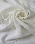 Pure viscose chiffon in white, color reference Marshmallow. Very soft and light, transparent and flowy. Ideal for dresses, skirts, blouses, and shirting. High-quality deadstock collected in Stock from a Maison de Couture in Italy.