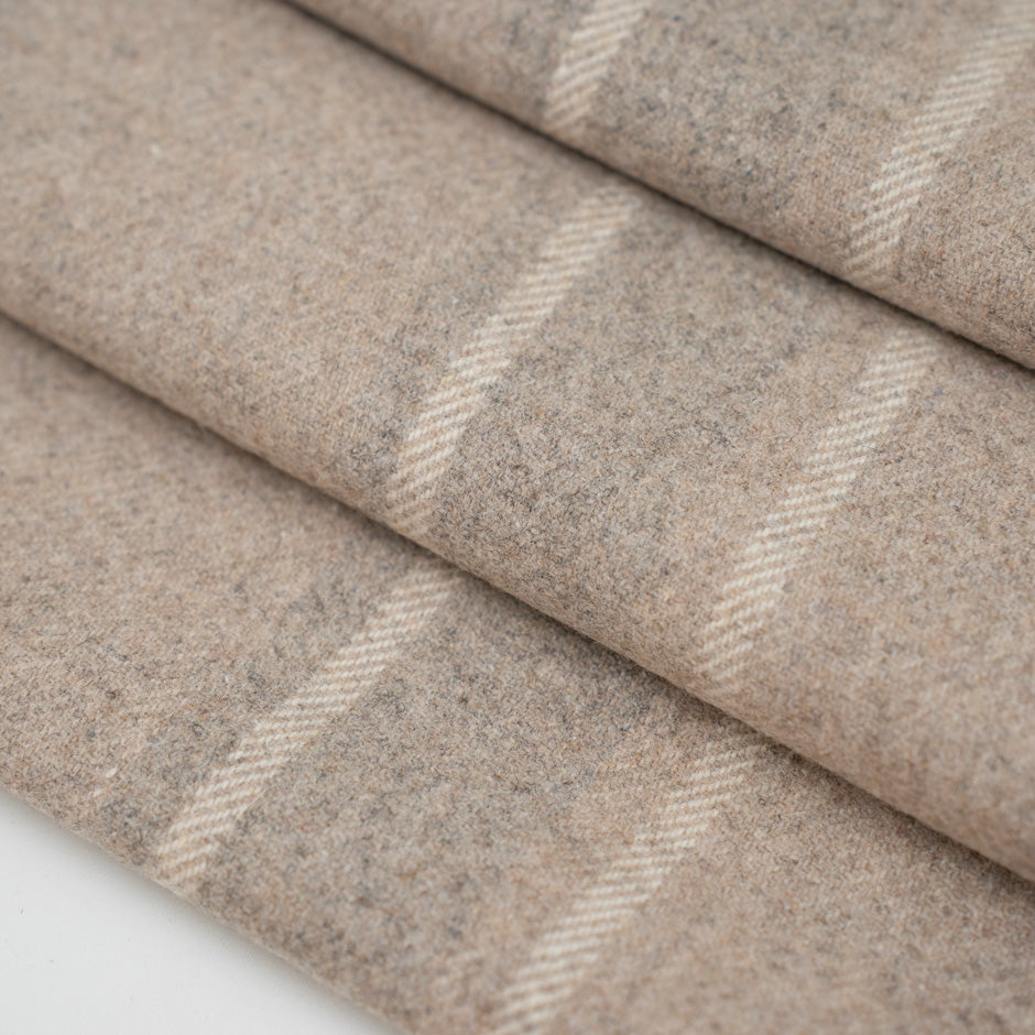 Wool beige striped jacket weight. The fabric is heavy and structured. High-quality deadstock fabric collected in Stock from a Maison de Couture in Italy.