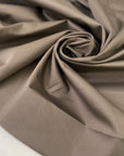 Double-face stretch cotton satin with brindle on one side and taupe gray on the other. Soft, elegant, and structured. Ideal for trousers, skirts, dresses, and light jackets.
High-quality deadstock collected in Stock from a Maison de Couture in Italy.