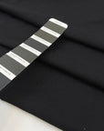 Very soft and warm-touch stretch cotton in black. Lightweight and solid color. High-quality deadstock collected in Stock from a Maison de Couture in Italy.