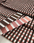 Soft cotton gabardine with elastane checked design. Multicolor in the shades of pink, white and dark brown. High-quality deadstock fabric by the meter collected in Stock from a Maison de Couture in Italy.