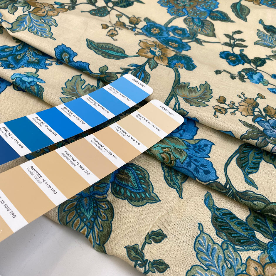 Cotton and linen, the ground is sand color, with beautiful flower designs in shades of light blue and green. It is very soft and light. High-quality deadstock fabric collected in Stock from a Maison de Couture in Italy.