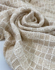 Heavy cotton tweed in vanilla white with check pattern and booklet texture. Very soft and structured, ideal for jackets, coats, and skirts. High-quality deadstock collected in Stock from a Maison de Couture in Italy.