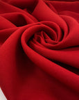 Double wool crepe in red, heavy and flowy. High-quality deadstock collected in Stock from a Maison de Couture in Italy.