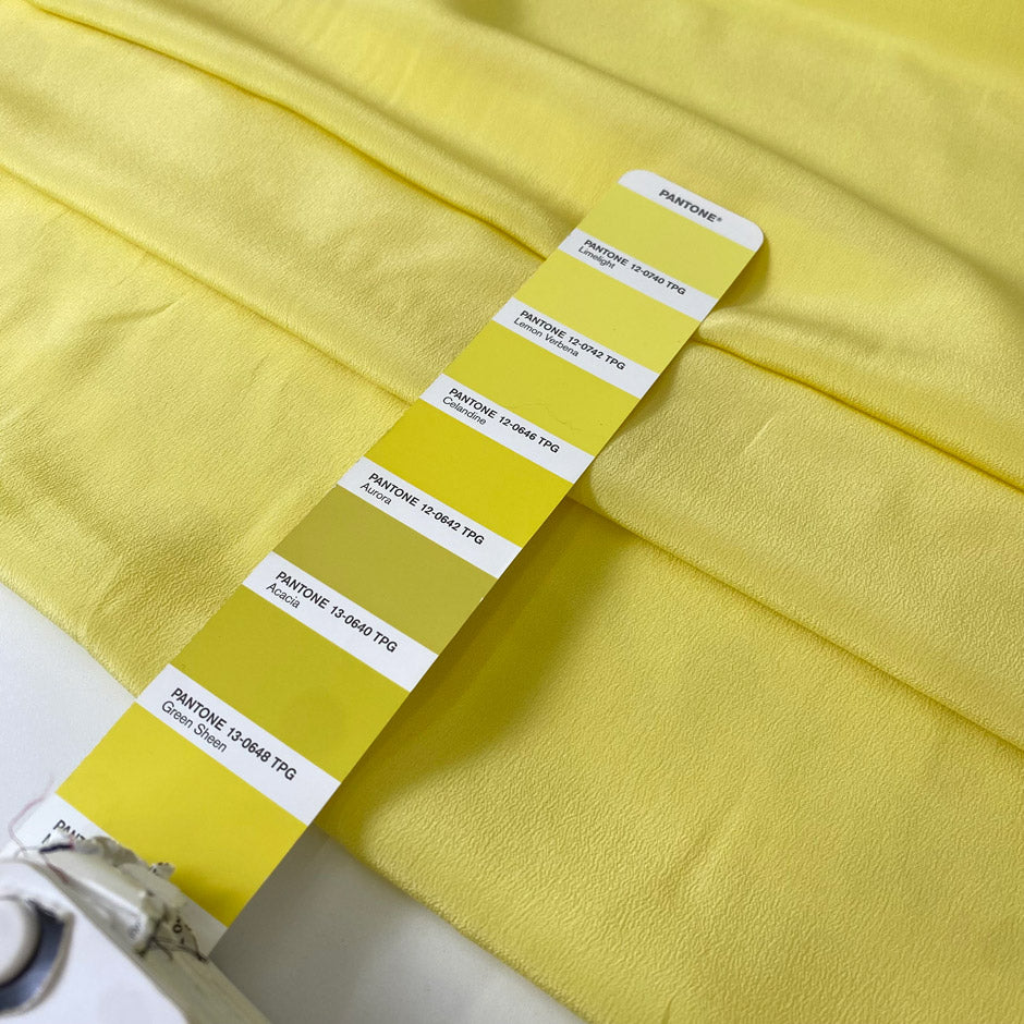 Light and soft yellow silk crêpe de chine with a fluid drape and slight transparency. Perfect for dresses, blouses, skirts, and shirting.
High-quality deadstock collected in Stock from a Maison de Couture in Italy.
