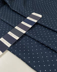 Cotton poplin with polka dot design in dark blue and white, very soft, light, and not transparent, ideal for shirts, dresses, and skirts. High-quality deadstock collected in Stock from a Maison de Couture in Italy.