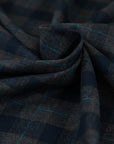 Blue and gray square flannel in pure virgin wool. High-quality deadstock fabric by the meter collected in Stock from a Maison de Couture in Italy.