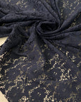 Blue polyester stretch lace with floral design very soft and light ideal for dresses skirts blouses and trousers. High-quality deadstock collected in Stock from a Maison de Couture in Italy.
