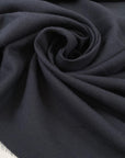 Pure cotton flannel in dark blue, soft, light and warm. High-quality deadstock fabric collected in Stock from a Maison de Couture in Italy.