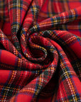 Red, green, yellow and blue mixed plaid wool fabric. High quality deadstock fabric.