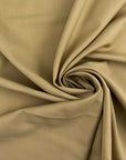 Beige stretch wool and very soft. Perfect for trousers. High-quality deadstock collected in Stock from a Maison de Couture in Italy.
