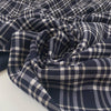 Polyester and viscose cady with elastane. Scottish pattern in the shades of dark blue and white. Very soft, double face. High-quality deadstock collected in Stock from a Maison de Couture in Italy. Polyester and viscose cady with elastane. Scottish pattern in the shades of dark blue and white. Very soft, double face. High-quality deadstock collected in Stock from a Maison de Couture in Italy.