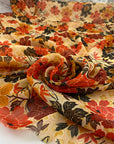 Polyester and lurex chiffon in orange and red shades. Very soft, flowy and, transparent. High-quality deadstock fabric by the meter collected in Stock from a Maison de Couture in Italy.
