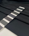 Very light black polyester taffeta with a crisp crunchy texture ideal for structured garments and voluminous shapes. High-quality deadstock collected in Stock from a Maison de Couture in Italy.